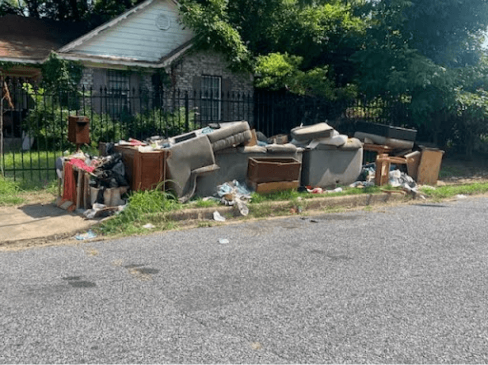 Discarded trash pile on West Waldorf Avenue in South Memphis: Mr. Otha Farris, Jr.